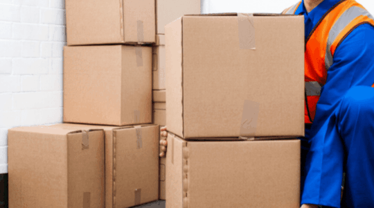 lifting-large-brown-boxes