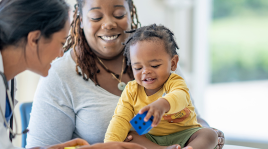 doctor-caring-for-child